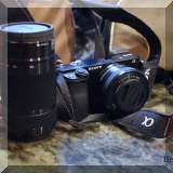 E10. Sony digital camera and lens. 